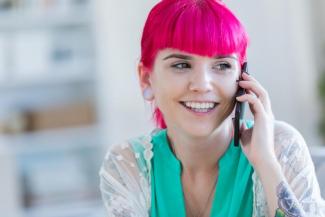 Image of person holding a mobile phone near their ear