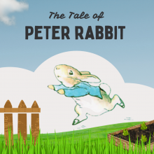 Brown rabbit in a blue coat running across grass towards a brown picket fence