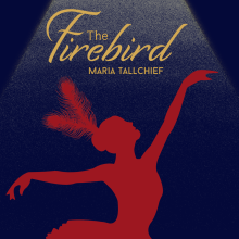 Silhouette of a ballerina in a feather headpiece posing with arms raised under a spotlight